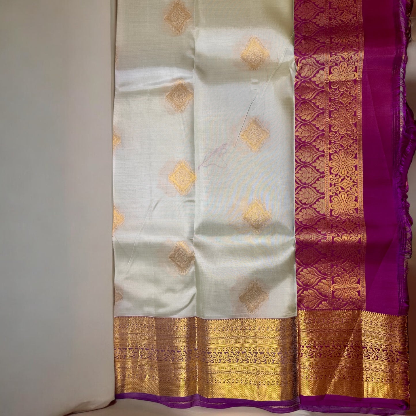 PURE SILK SAREE – PISTA GREEN WITH DIAMOND BUTTA AND PURPLE MEDIUM BORDER