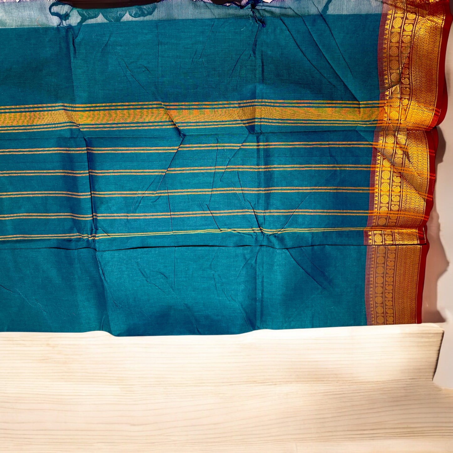 KANJIVARAM COTTON SAREE – PLAIN BLUE BODY WITH GOLDEN RED MEDIUM BORDER