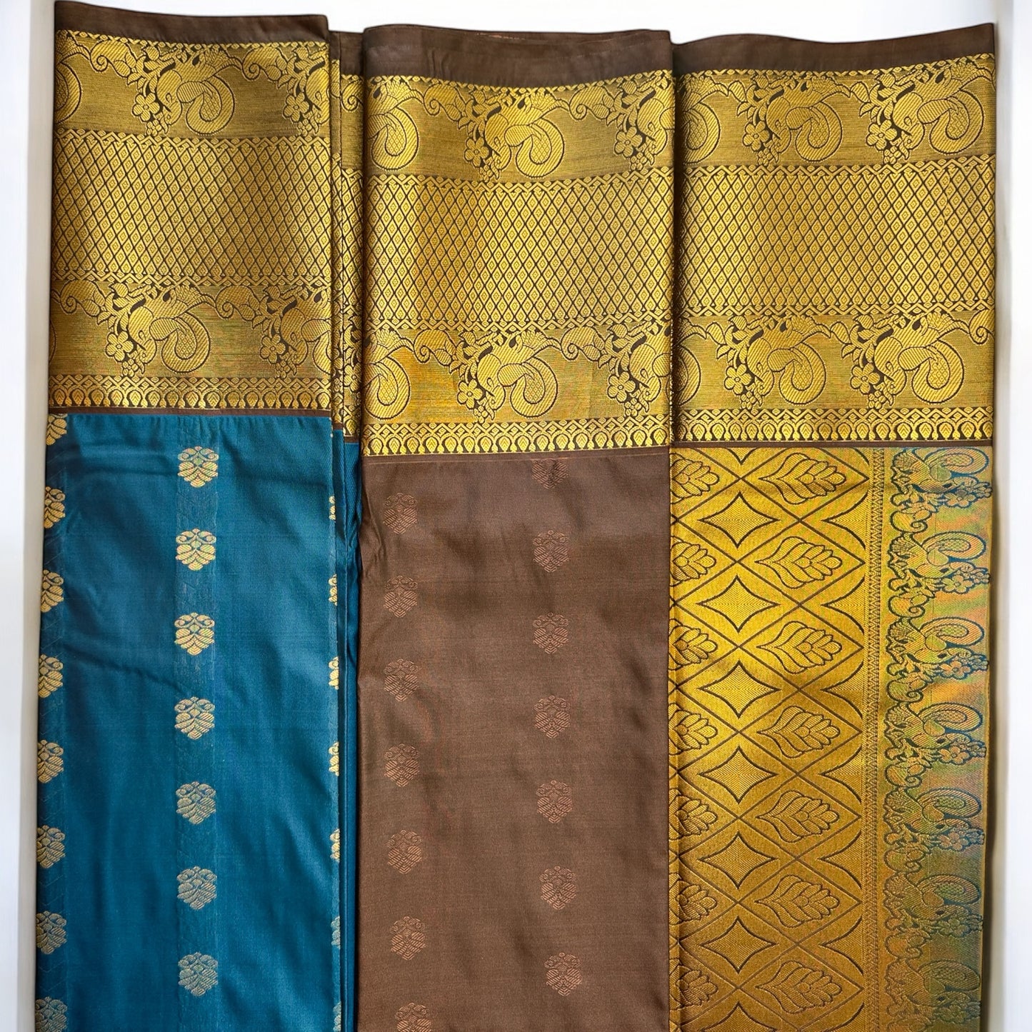 SILK SAREE – CLASSY BLUE WITH FLORAL BUTTA AND RICH GOLDEN-BROWN BIG BORDER