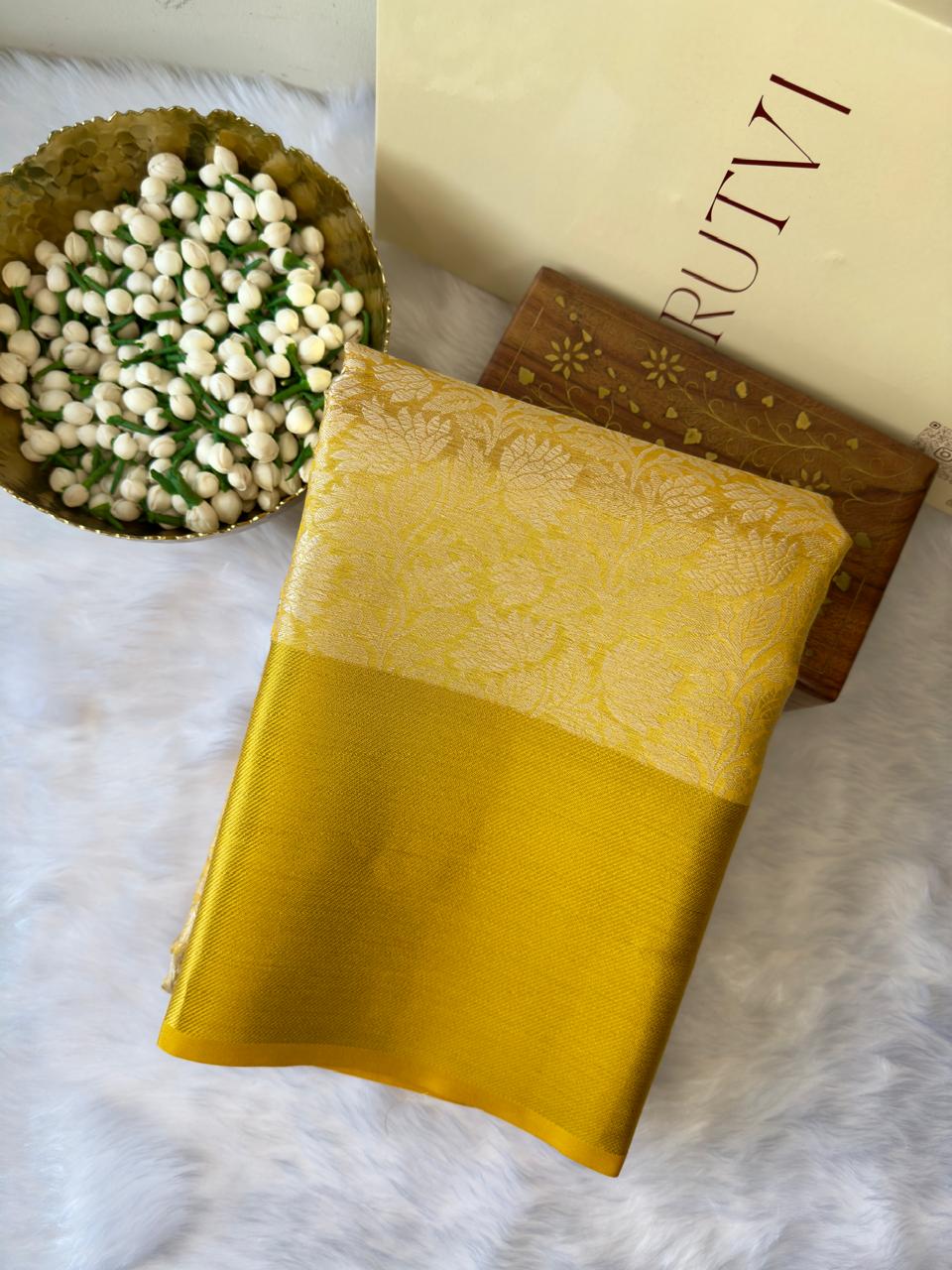 YELLOW SOFT TISSUE SILK SAREE WITH GOLD DESIGN AND ZARI BORDER