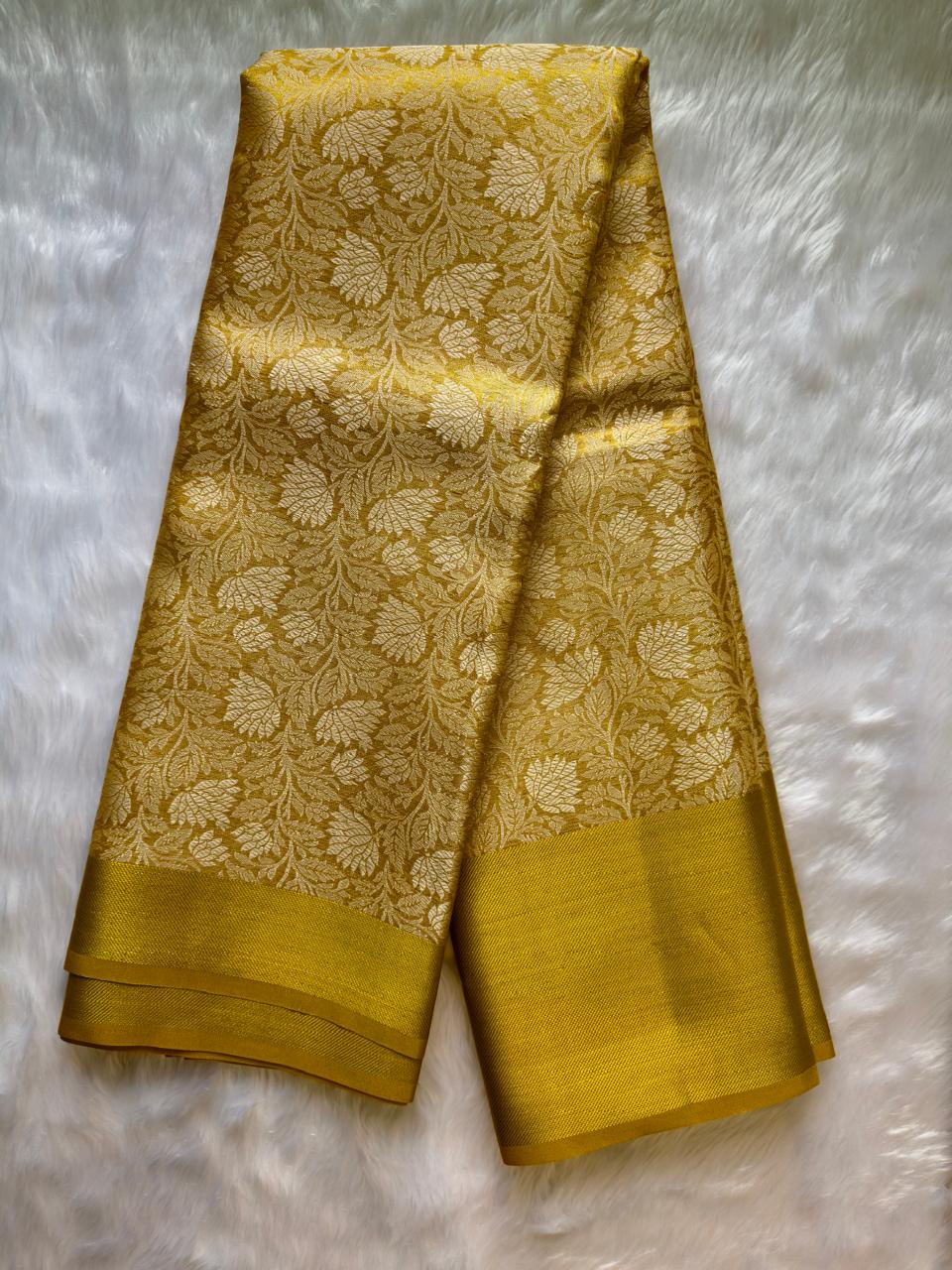 YELLOW SOFT TISSUE SILK SAREE WITH GOLD DESIGN AND ZARI BORDER