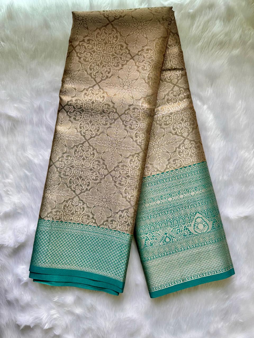RICH SILVER DUAL-TONE WITH PASTEL SEA GREEN AND SILVER ZARI WORK