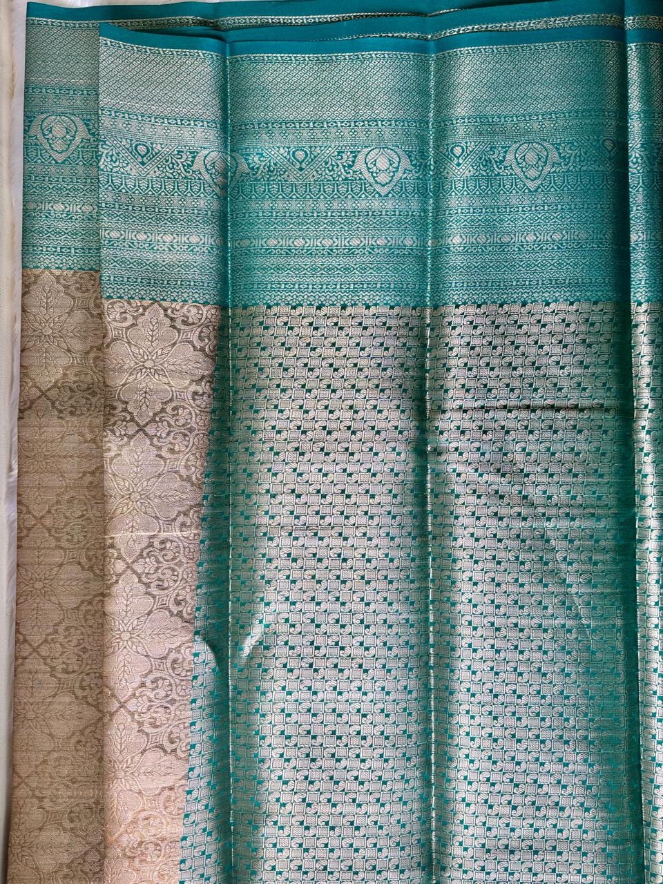 RICH SILVER DUAL-TONE WITH PASTEL SEA GREEN AND SILVER ZARI WORK