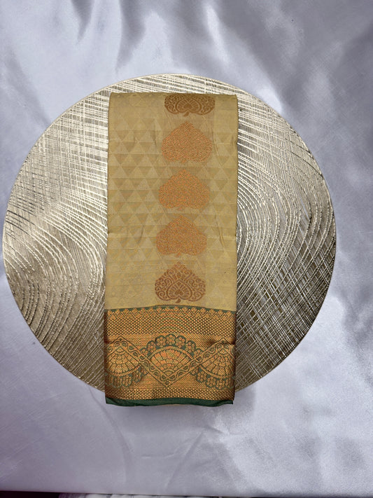 SILK SAREE – CREAM WITH DESIGN BUTTA + DARK GREEN MEDIUM BORDER