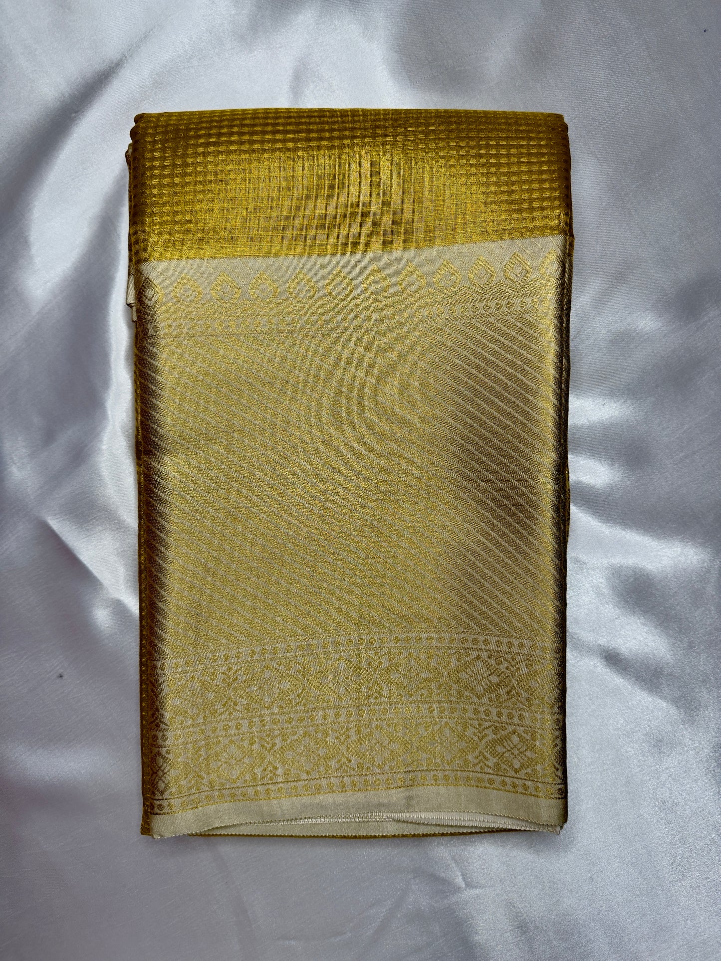 TISSUE SAREE – GOLDEN/YELLOW SMALL CHECKS WITH OFF-WHITE BIG BORDER ZARI WORK