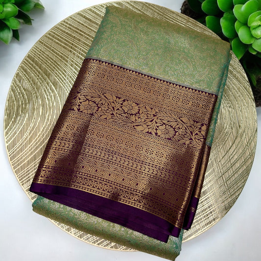 TISSUE SILK SAREE – PISTA GREEN WITH GOLDEN PRINT & DARK PURPLE BIG BORDER