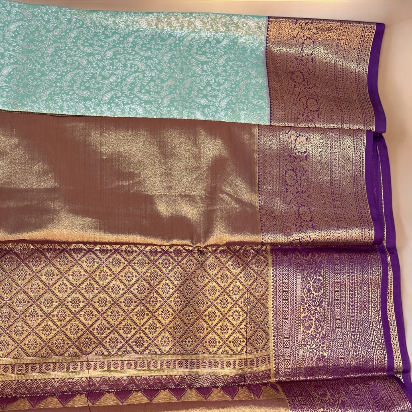 TISSUE SILK SAREE – PISTA GREEN WITH GOLDEN PRINT & DARK PURPLE BIG BORDER