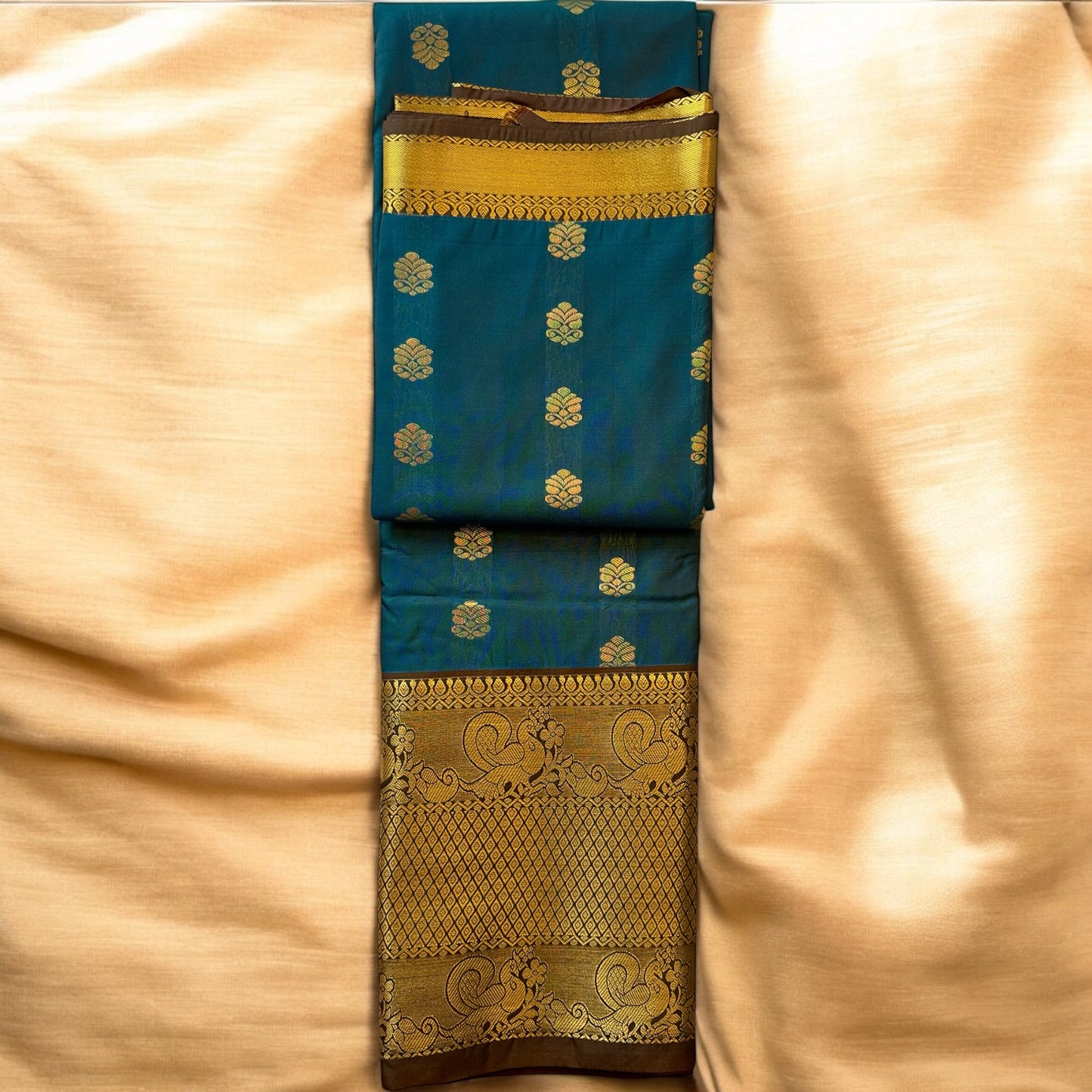 SILK SAREE – CLASSY BLUE WITH FLORAL BUTTA AND RICH GOLDEN-BROWN BIG BORDER