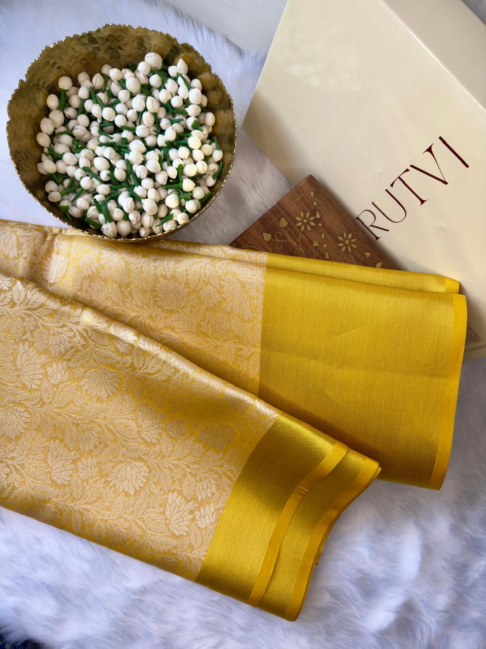 YELLOW SOFT TISSUE SILK SAREE WITH GOLD DESIGN AND ZARI BORDER