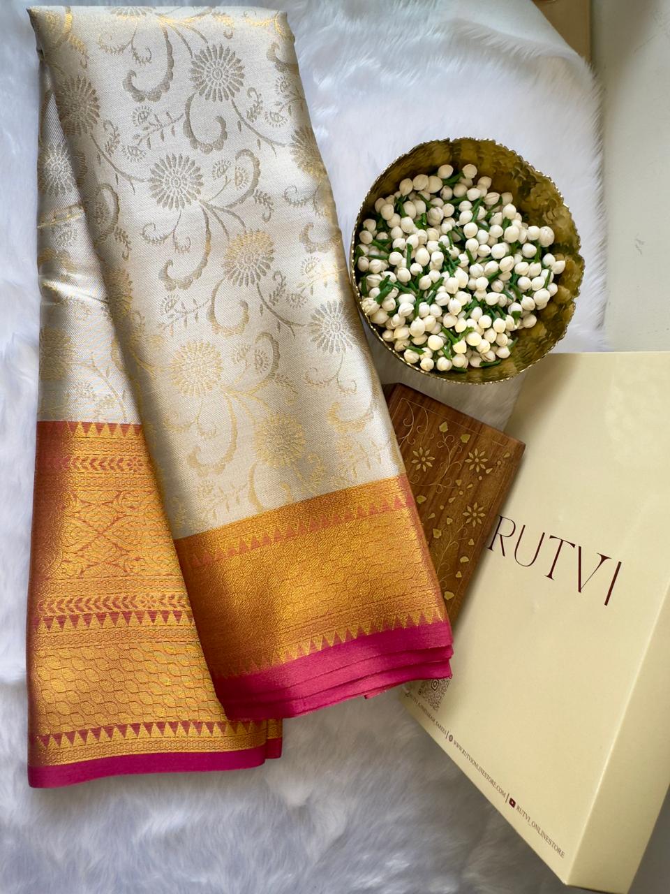 CREAM SOFT SILK SAREE WITH GOLDEN DESIGN AND RICH RED BIG BORDER