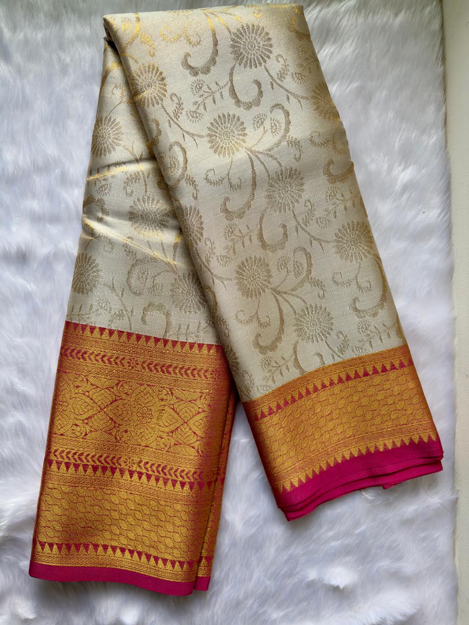CREAM SOFT SILK SAREE WITH GOLDEN DESIGN AND RICH RED BIG BORDER