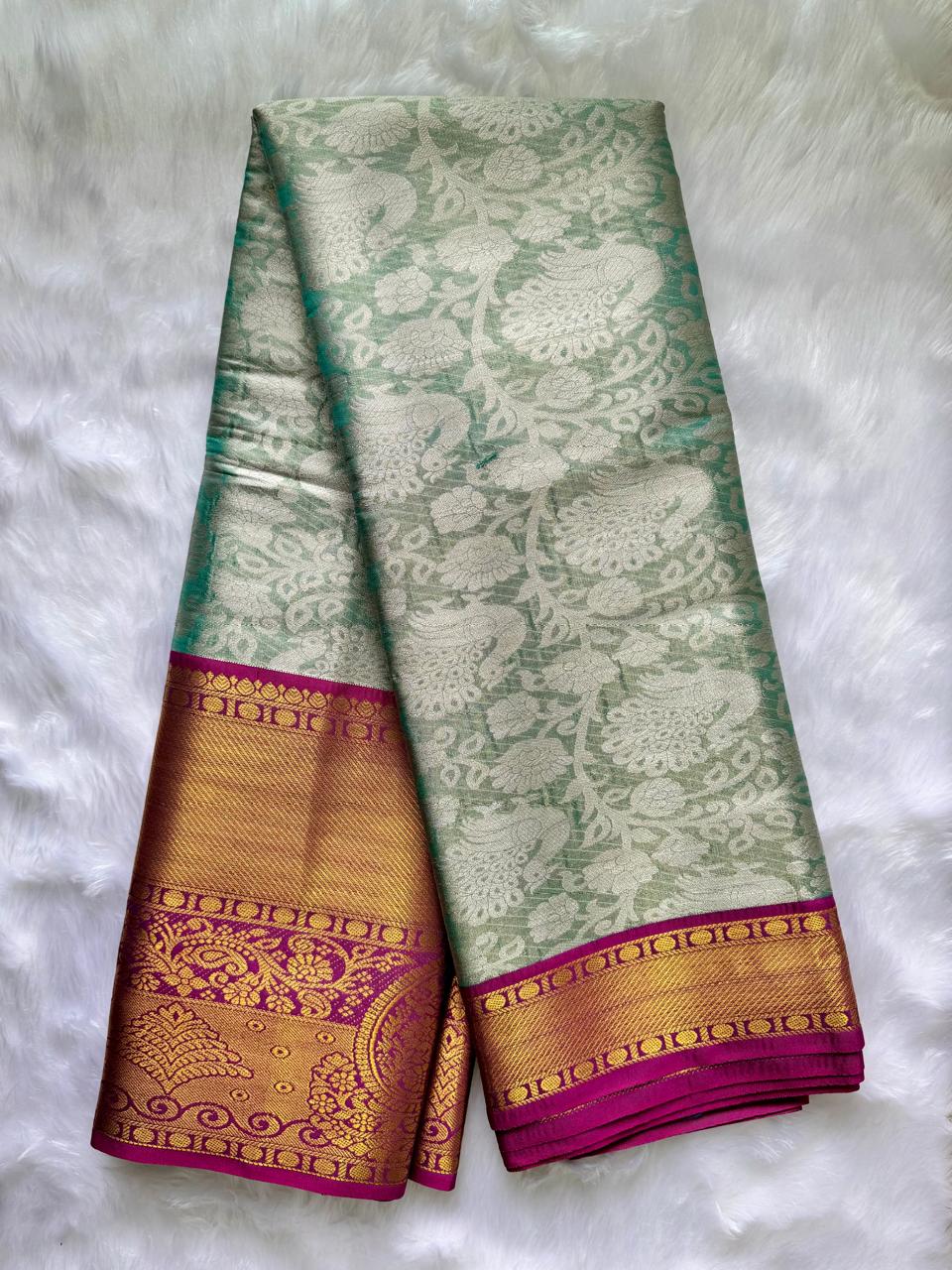 LIGHT BLUE WITH PURPLE & GOLD ZARI AND ALL-OVER FLORAL MOTIFS
