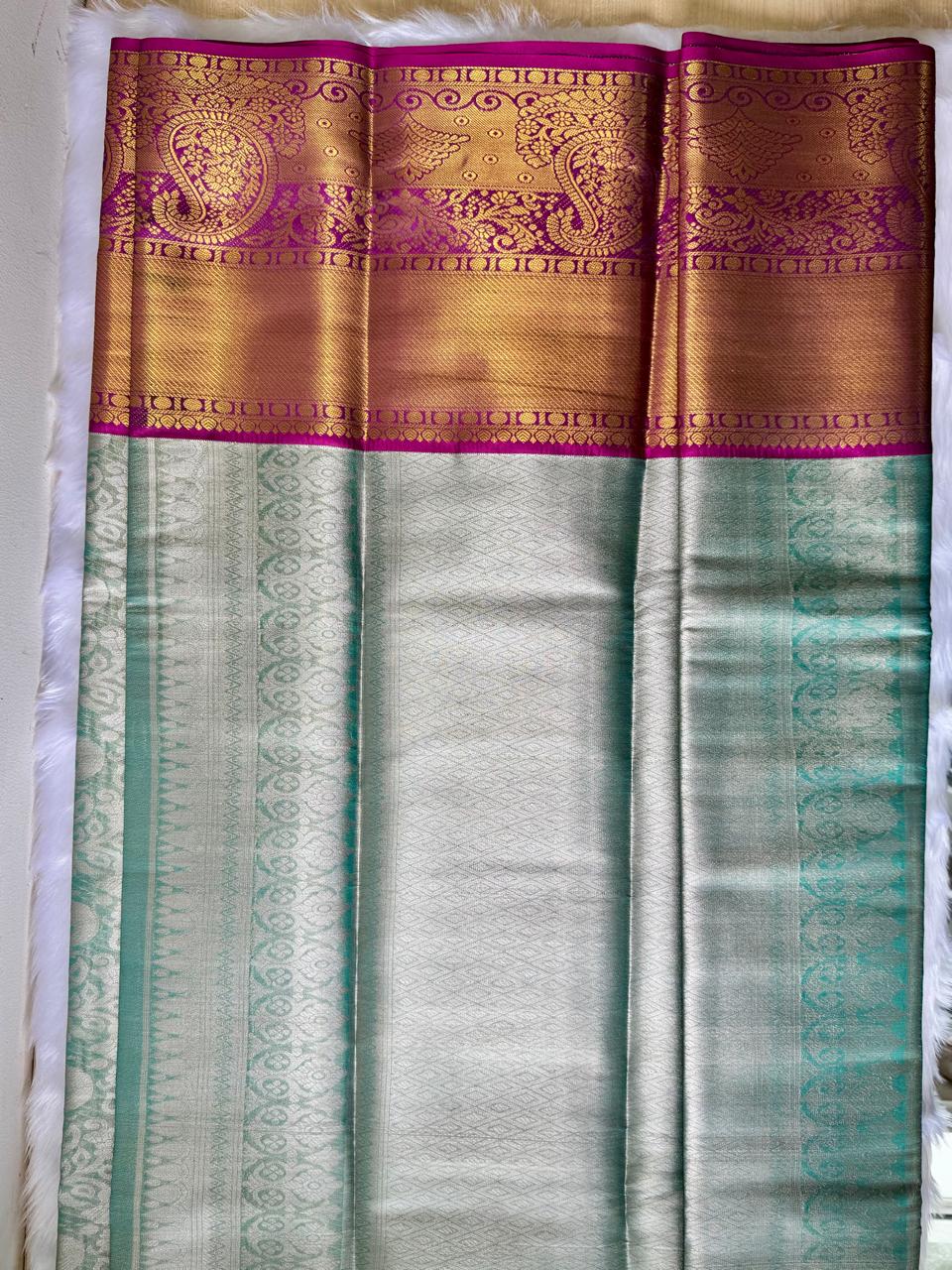 LIGHT BLUE WITH PURPLE & GOLD ZARI AND ALL-OVER FLORAL MOTIFS