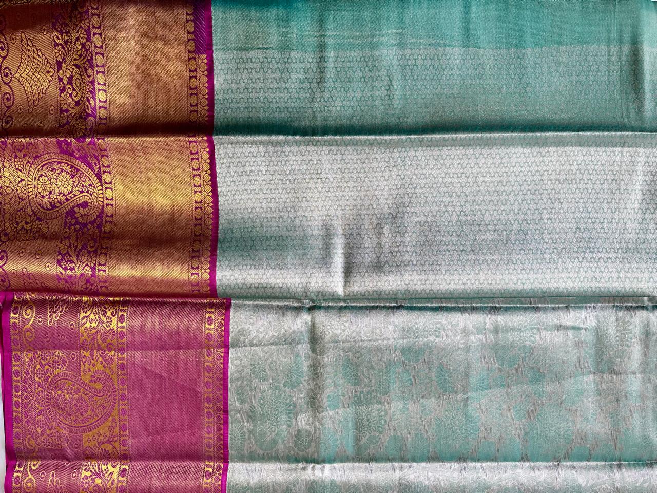 LIGHT BLUE WITH PURPLE & GOLD ZARI AND ALL-OVER FLORAL MOTIFS