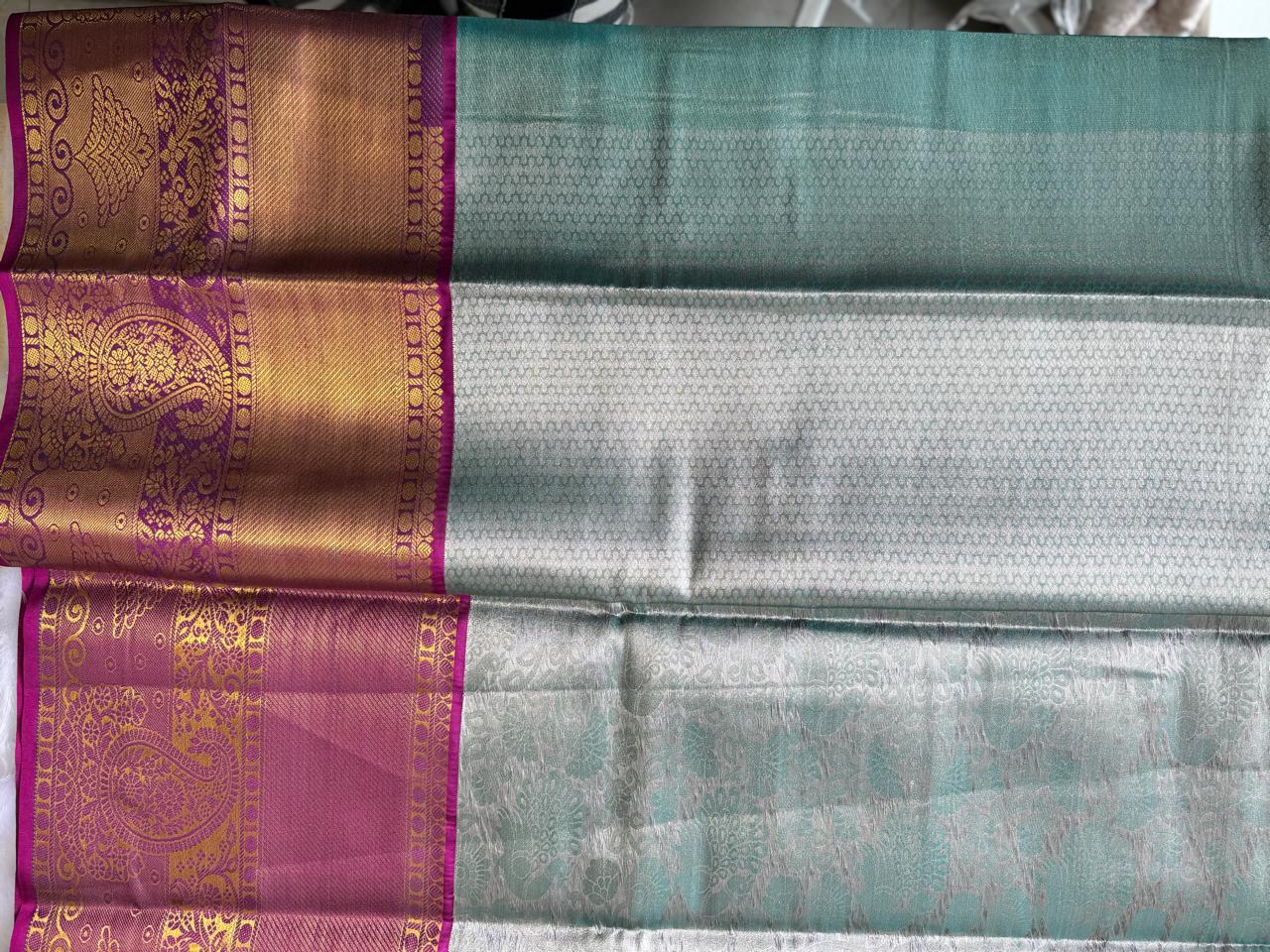 LIGHT BLUE WITH PURPLE & GOLD ZARI AND ALL-OVER FLORAL MOTIFS