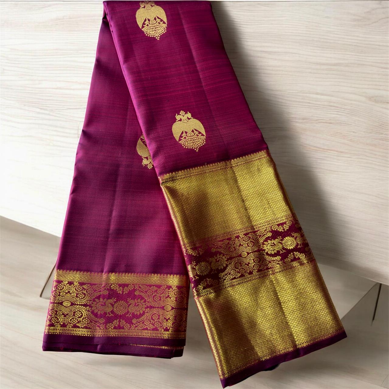 RICH MAGENTA WITH BIG GOLD ZARI BORDER