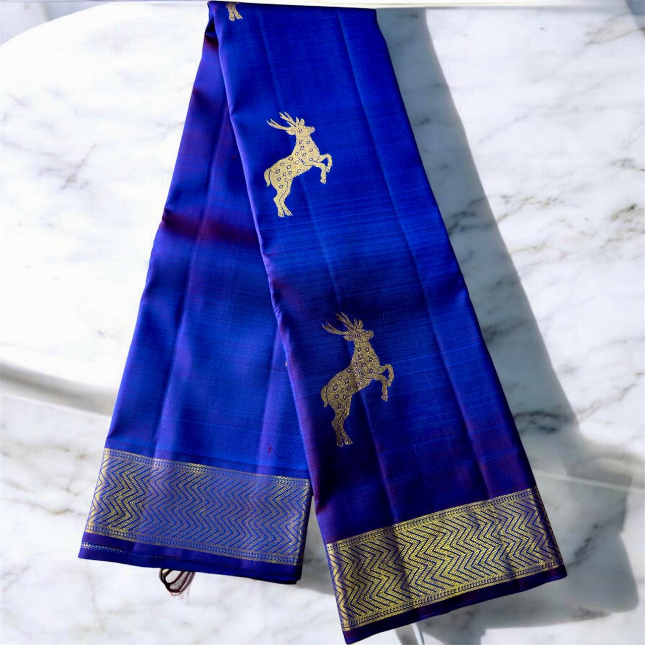 ROYAL BLUE WITH SMALL BORDER AND DEER MOTIFS