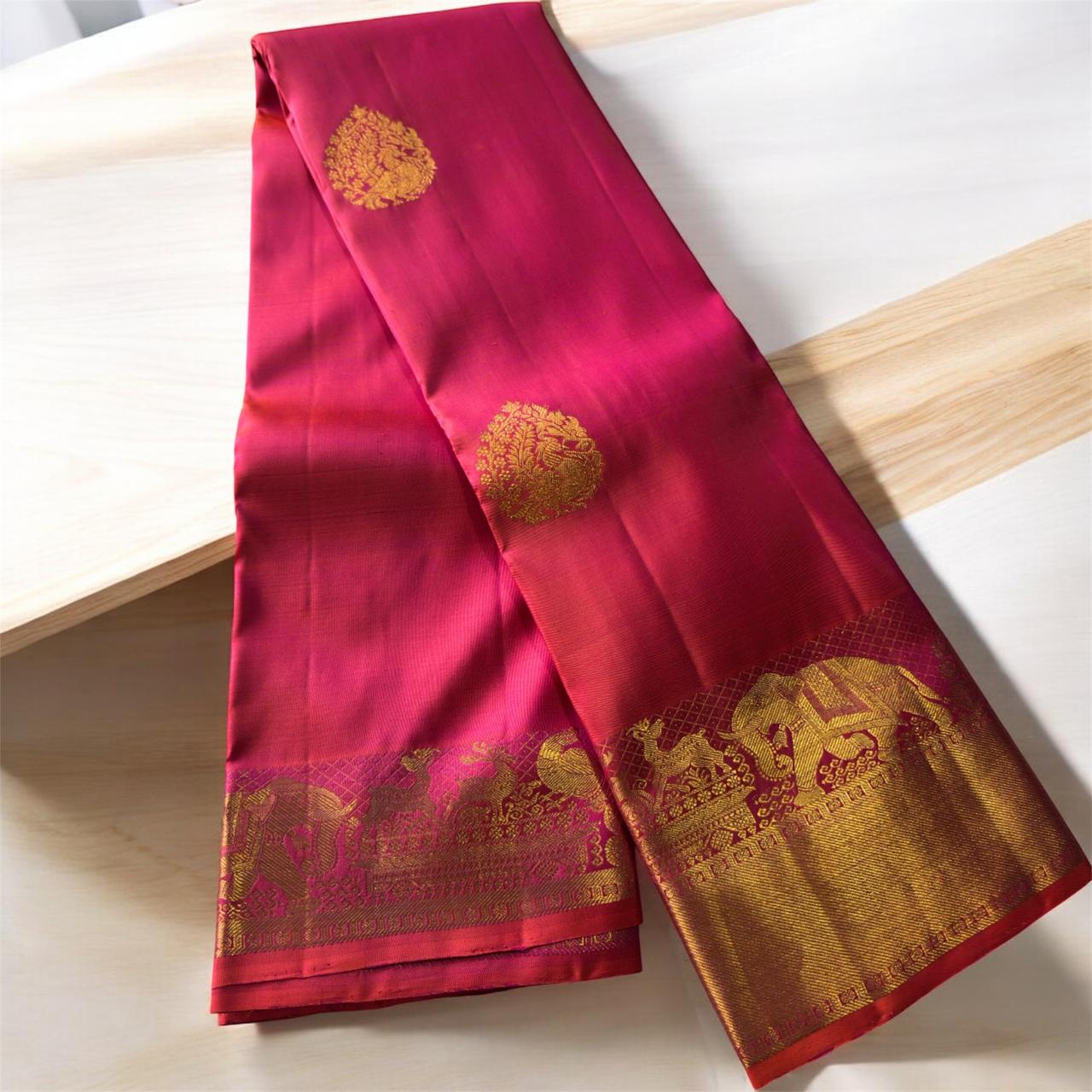 DEEP REDDISH PINK WITH ELEPHANTS, HORSES & TEMPLE ZARI BORDER